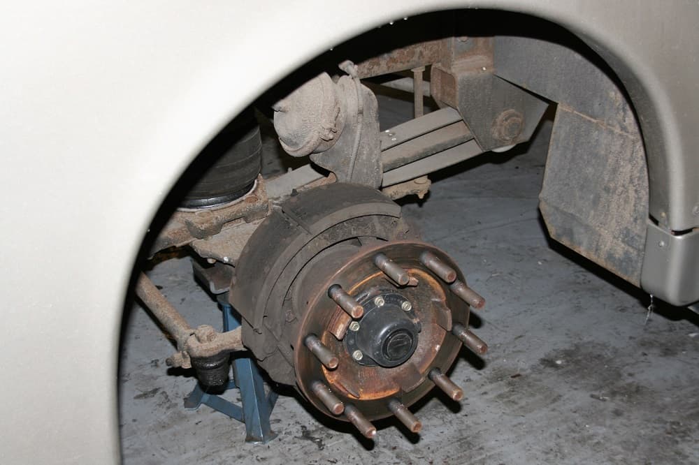 Removal of the brake drum to gain access to the brake linings.