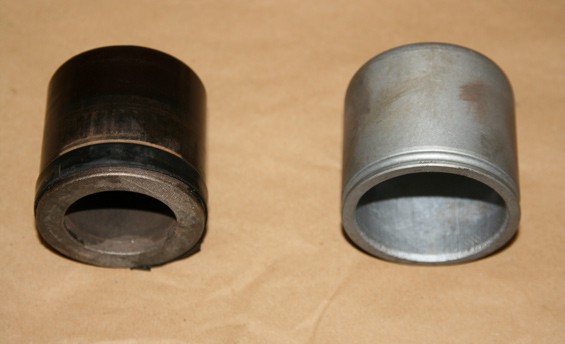 Here you can see the phenolic piston on the left and the steel piston on the right.